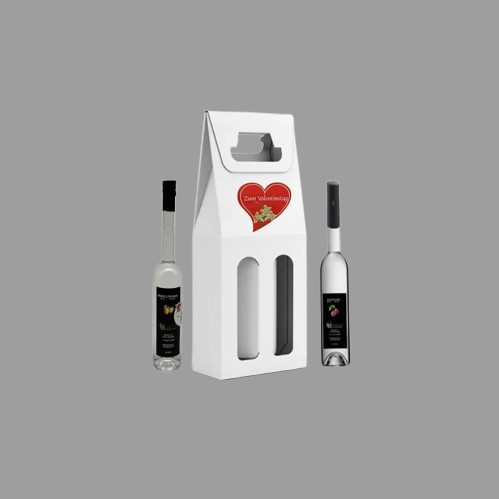 weßer Tragekarton mit 2 Sichtfenstern zum Valentinstag befüllt mit 2 Flaschen Edelbrand