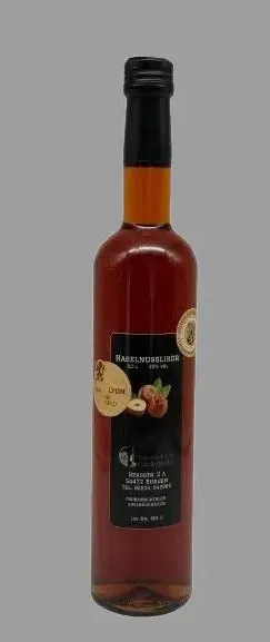 Haselnusslikör 0,5 l in Glasflasche Bordeaux mit Schraubverschluss, zweifach mit Gold prämiert